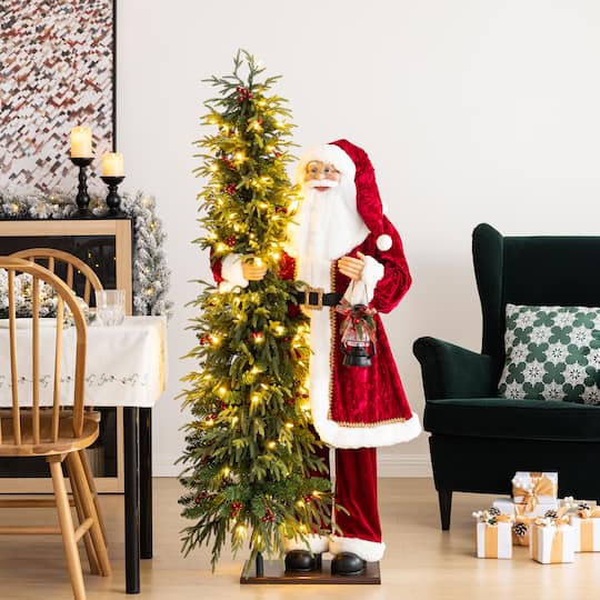 Glitzhome® 4ft. Oversized Traditional Christmas Santa with 5ft Lighted PE Dripping Christmas Tree